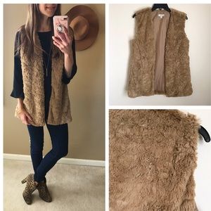 Charming Charlie faux fur vest.